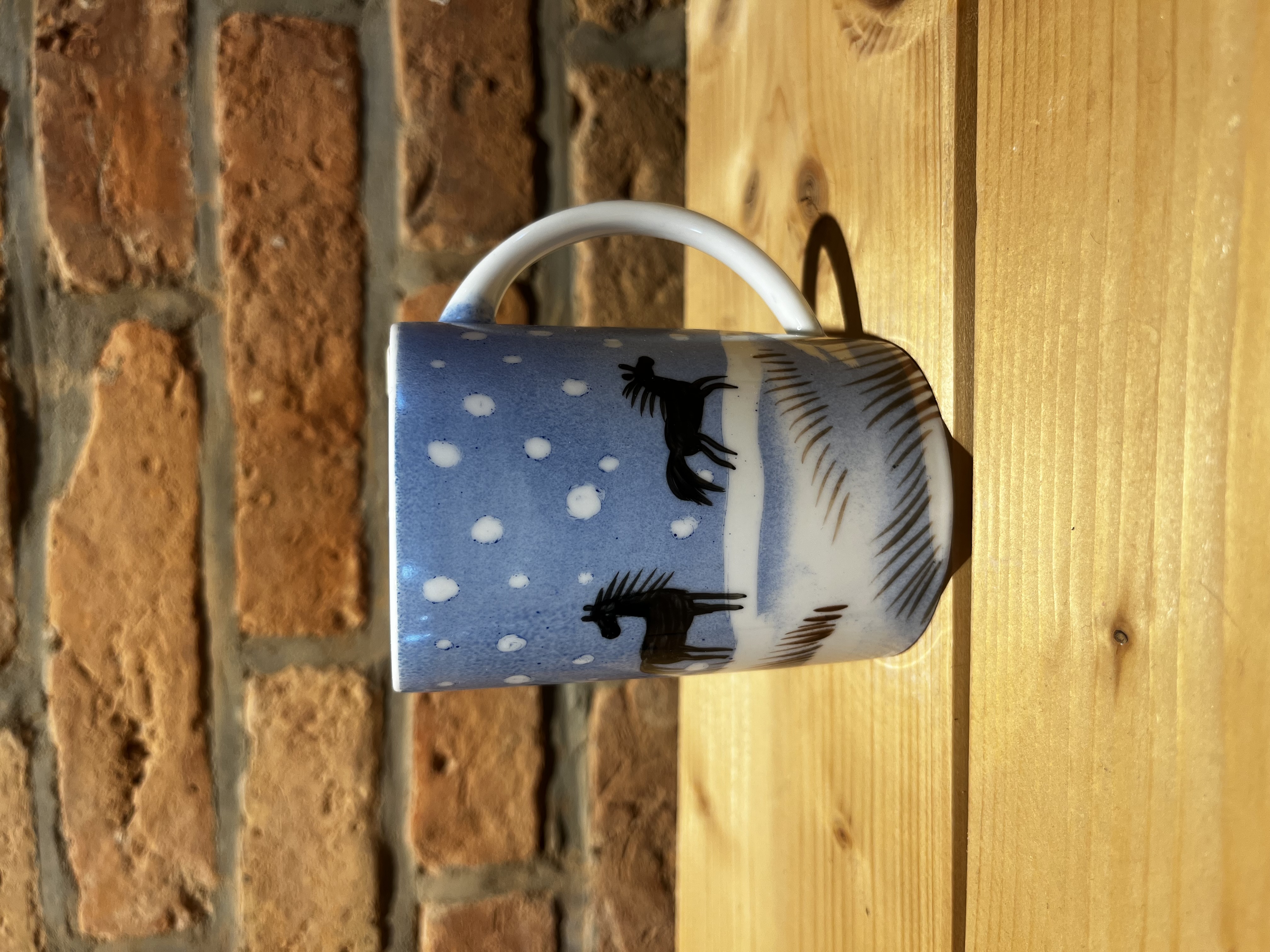 Porzellan Tasse Pferde im Schnee